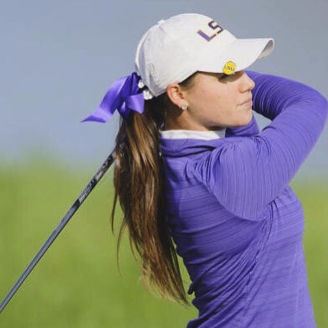 Carly golfing